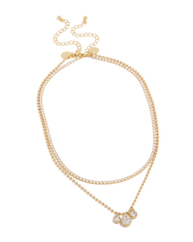 gold layered necklace: a sparkly tennis chain and a fine chain with clear droplet pendants