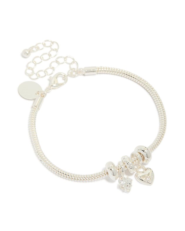 silver chain bracelet with a sparkly bow charm and heart charms